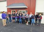 Ribbon cutting ceremony for Addison County Alignment and Repair in New Haven, VT