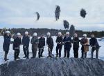 Throwing dirt at the groundbreaking for the Stonecrop Meadows housing project in Middlebury.