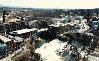 Aerial view of downtown Middlebury and the waterfall in the winter