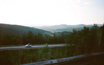 An electric car driving on a Vermont highway